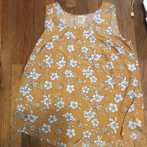 Gold tank top with white and navy flowers